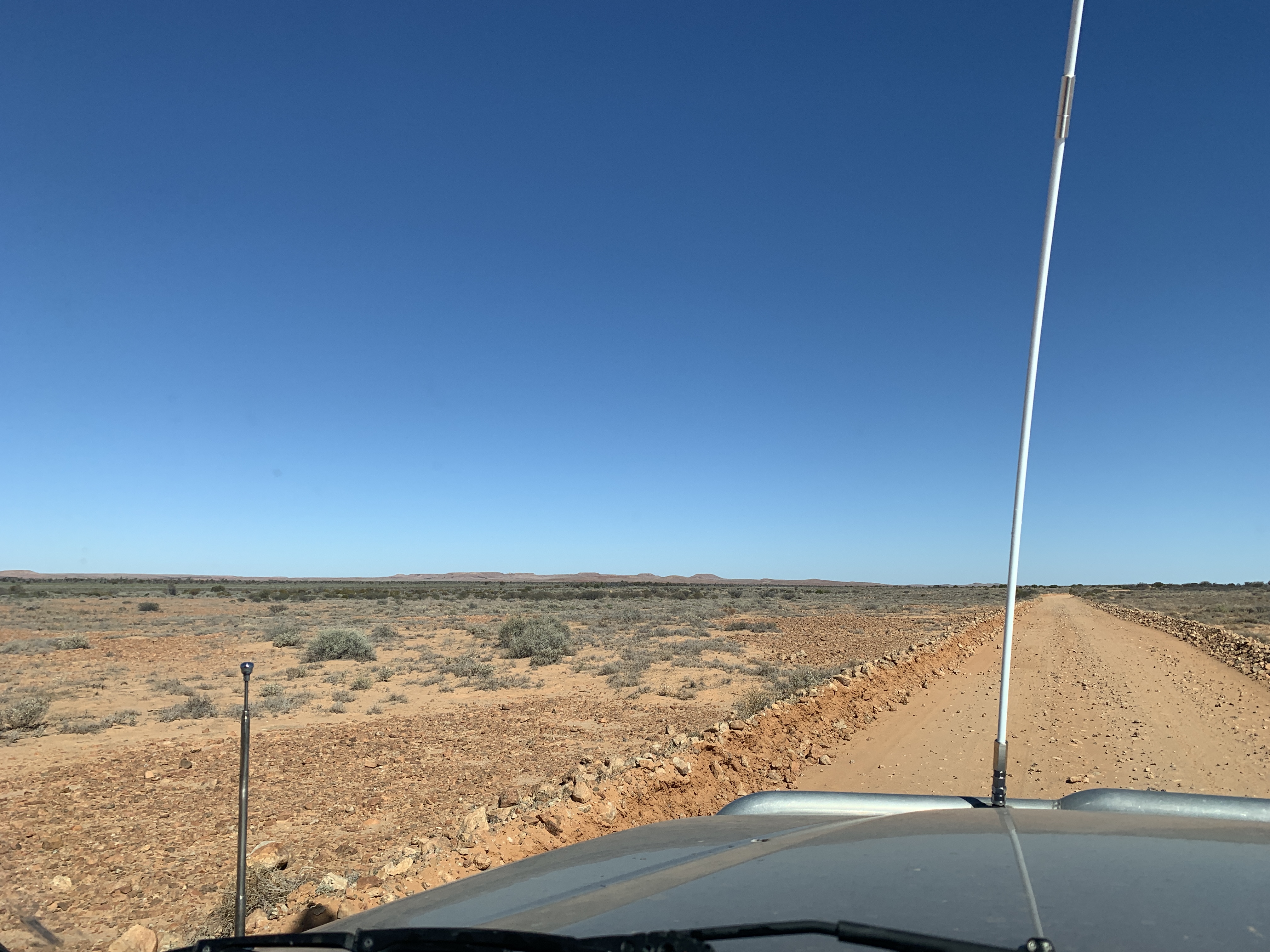 Outback dirt road stretching to the horizon