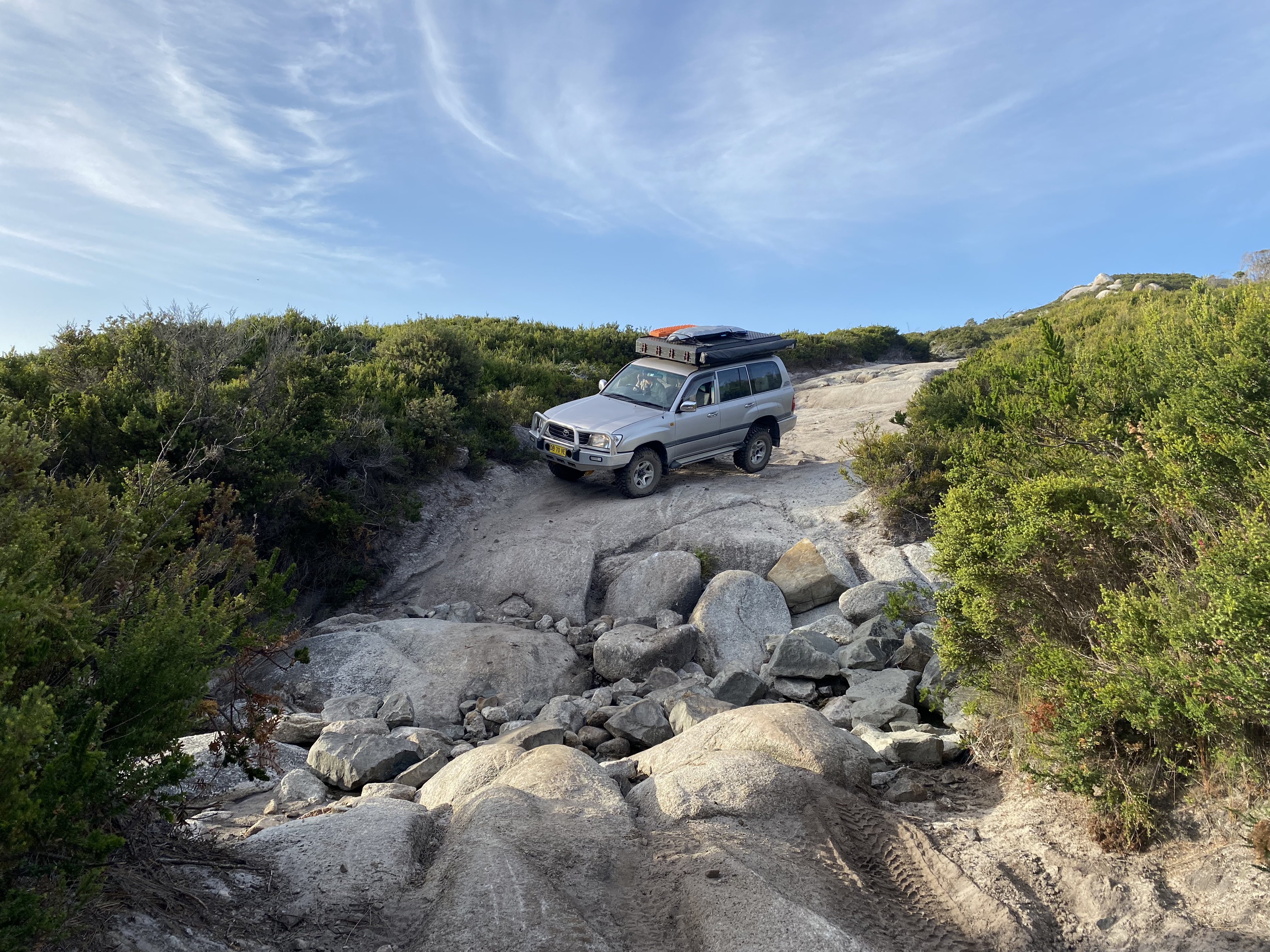 Landcruiser navigating rocky terrain